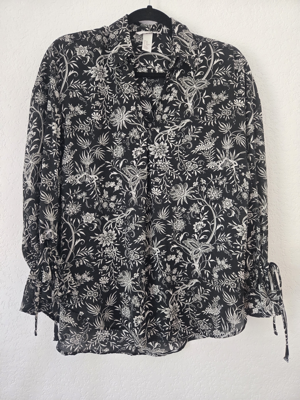 H&M Black and White Floral Tie-Cuff Blouse